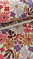 Preview: Sweat - angerauht - Blumen - grau-beige melliert
